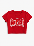 Corea Red Logo Baby Tee — Women’s Cropped Micro-Rib Graphic Tee